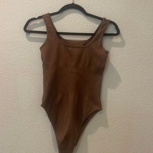 Body contour body suit